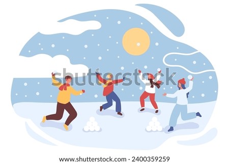 Children play snowballs. Active winter entertainment. Children play with snowballs on the street.