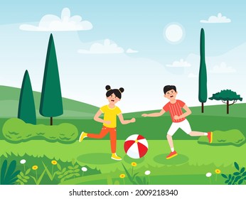 Children playing with ball in park in summer
