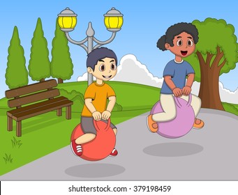 Children playing bouncing ball in the park