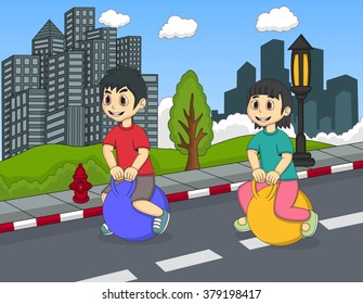 Children playing bouncing ball in the street
