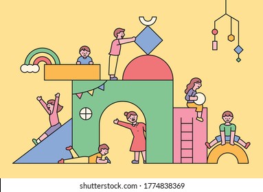 Children are playing in a huge block. flat design style minimal vector illustration.