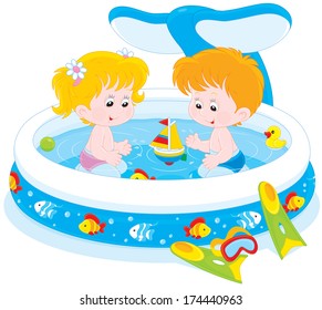 Children playing in an inflatable paddling pool