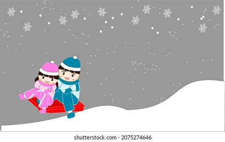 
Children playing on a sled in the snow