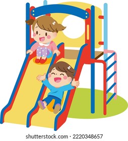 Children playing on a slide in the park