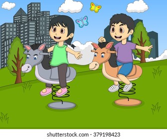 Children playing rocking horse in the park