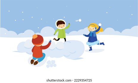 Children playing snowballs in winter