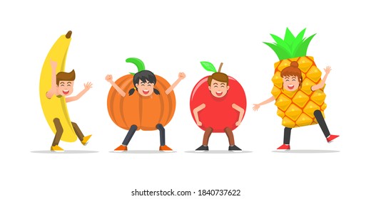 The children posing in fruit costumes