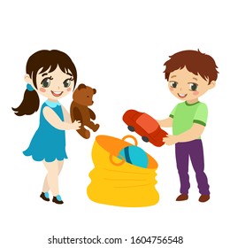 Children put toys in a bag. The order in the room. Cleaning toys.