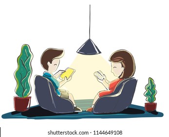 Children reading books at home at night cosy place