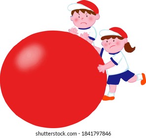 Children rolling big balls at the athletic meet