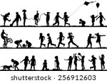 Children silhouettes playing outdoor