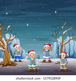 Children singing christmas carols on winter landscape
