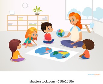 Children sit around world map and redhead female teacher demonstrates them model of planet Earth. Geography lesson at primary school concept. Vector illustration for poster, postcard, advertisement.