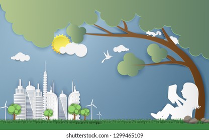 Children are sitting reading a book under a big tree,World environmental and sustainable development,Save the world with urban landscape concept.Paper art style.