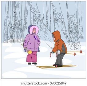 Children ski,play in the Park in winter.