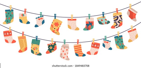 Children socks. Hanging colorful drying cotton or wool socks, cute baby clothes, socks hang on laundry rope vector illustration symbols set