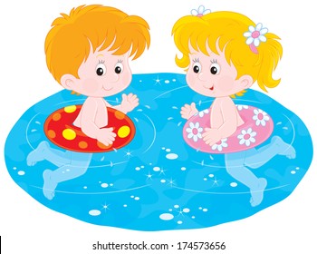 Children swim with inflatable circles