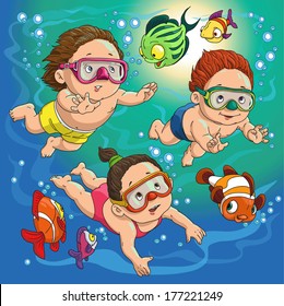 children swim in the sea with fish