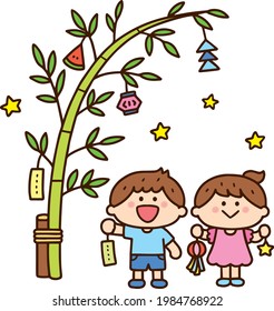 Children trying to decorate the Tanabata decoration