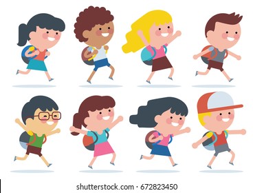 Niños de diversos grupos étnicos caminando al colegio.De vuelta a la escuela.