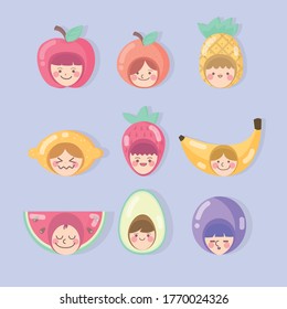 Niños con sombrero de fruta. Son felices.