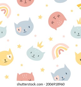 Childrens cartoon seamless pattern cute cats on a white background. Perfect for printing on fabric, wrapped paper, wallpaper, nursery clothing.