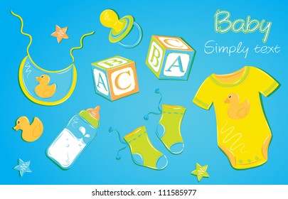 Children's clothes on a blue background baby pacifier, nipple, cubes, socks, toy, duck