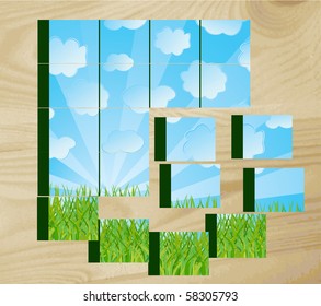 Children's cubes with the nature image on a wooden surface