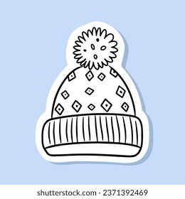 Children's hat warm winter clothes. warm knitted hat with ponpon pompom with scandinavian pattern winter doodles isolated on white background drawn by line winter sticker