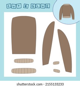 Children's paper puzzle with a  sweaters. Baby education cut and paste applique for preschool age.