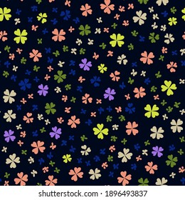 Childrens pattern flowers. Seamless floral pattern on a blue background. Multicolored clover leaves on a dark background.
