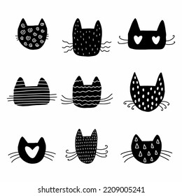 Children's pattern with the heads of cats, hand-drawn.	