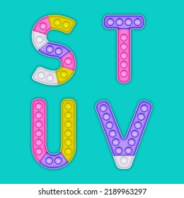 Children's pop it alphabet. A set of realistic antistress toys in the form of an letters.