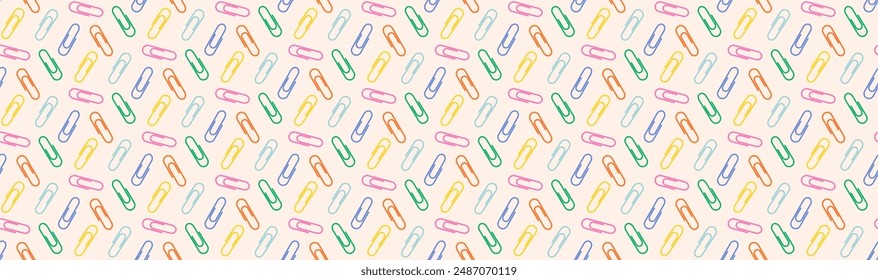 Childrens school pattern. Back to school. Colorful paper clips background