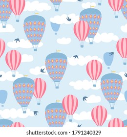 Children's seamless pattern with air balloons, clouds and birds on blue background. Cute texture for kids room design, Wallpaper, textiles, wrapping paper, apparel. Vector illustration