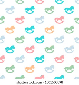 Children's seamless pattern design. Rocking horse. Vector background.Colored horses