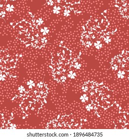 Childrens texture. Small white flowers and branches with moldings. Seamless floral pattern of flowers and branches with leaves on a coral background. Delicate shades.