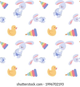 Childrens toys seamless pattern with teddy bear, bunny, rubber duck and cubes. Vector endless texture on white background