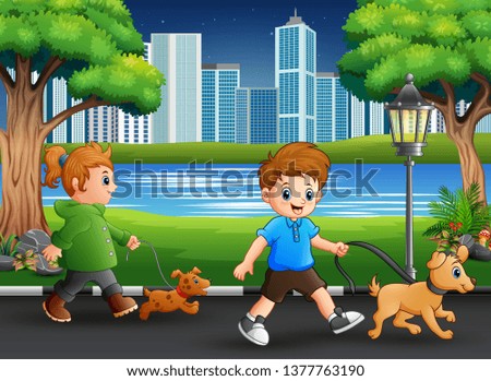Childrens walking with their pets on the street