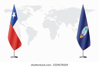 Chile and Guam flags for official meeting against background of world map.