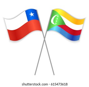 Chilean and Comoran crossed flags. Chile combined with Comoros isolated on white. Language learning, international business or travel concept.