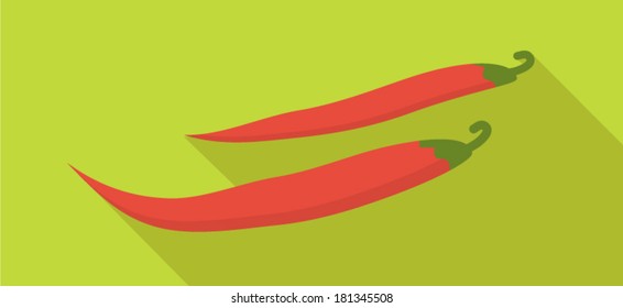 Chili peppers isolated on green background