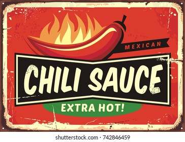 Chili sauce vintage tin sign with chili pepper and hot flame. Delicious Mexican food advertising on retro metal background. Vintage poster template.