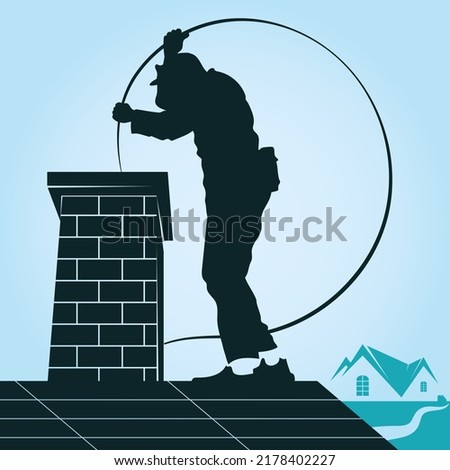 Chimney sweeper on the roof. Chimney sweep worker cleans the chimney
