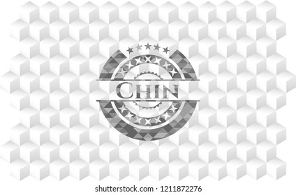 Chin  grey badge with geometric cube white background