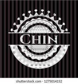Chin  silvery emblem or badge