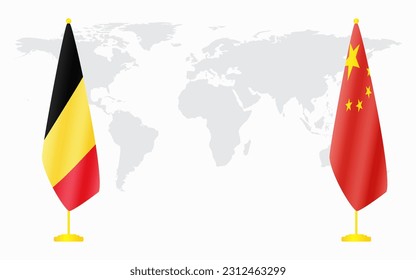 China and Belgium flags for official meeting against background of world map.