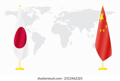 China and Japan flags for official meeting against background of world map.