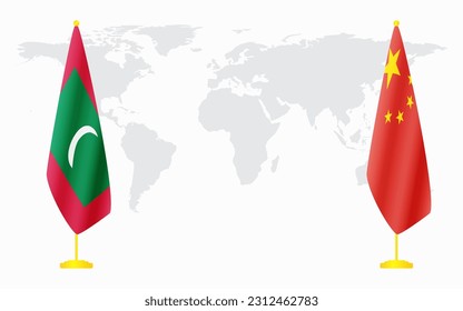 China and Maldives flags for official meeting against background of world map.