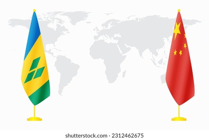 China and Saint Vincent and the Grenadines flags for official meeting against background of world map.